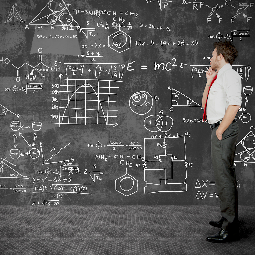 person with complicated chalkboard